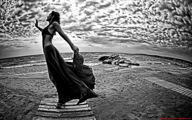woman on beach at sunset