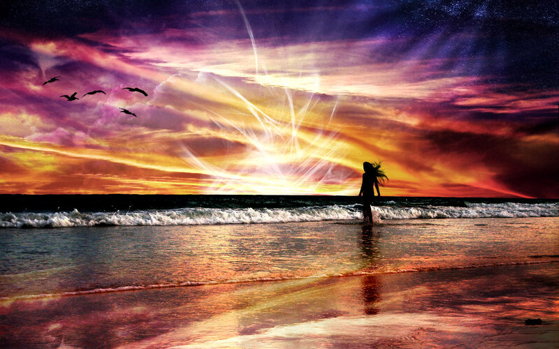 woman on beach at sunset