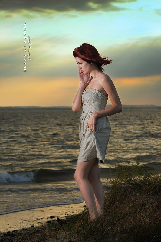 Woman on beach at sunset