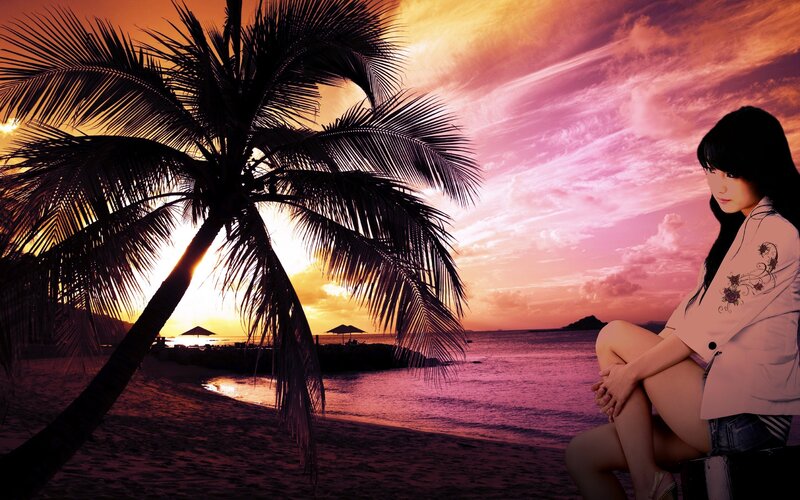 woman on beach at sunset