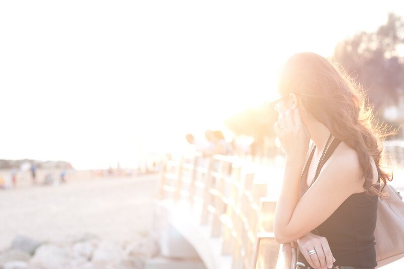 woman on beach at sunset
