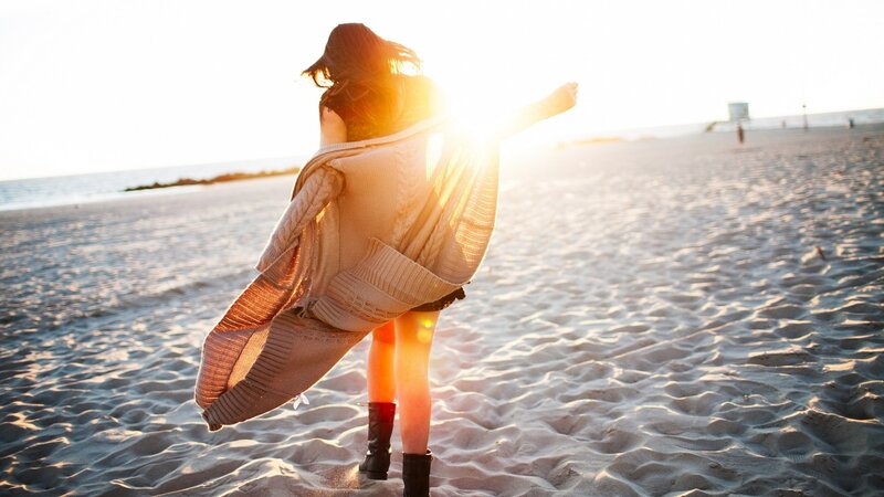 Woman on Beach at Sunset — Beige