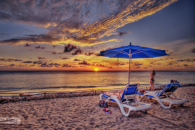 Woman on Beach at Sunset — Blue, Dramatic