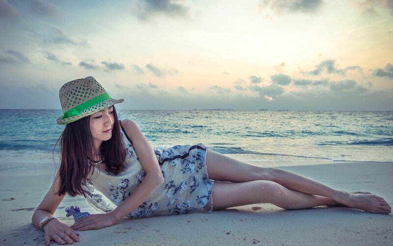 Woman on Beach at Sunset — Blue, Serene, Photograph, Hat