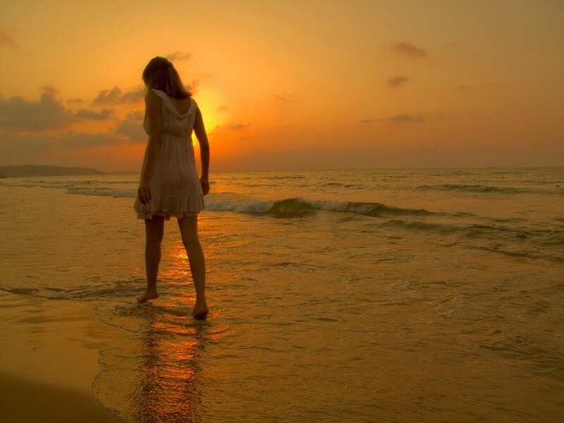 Woman on Beach at Sunset — Orange