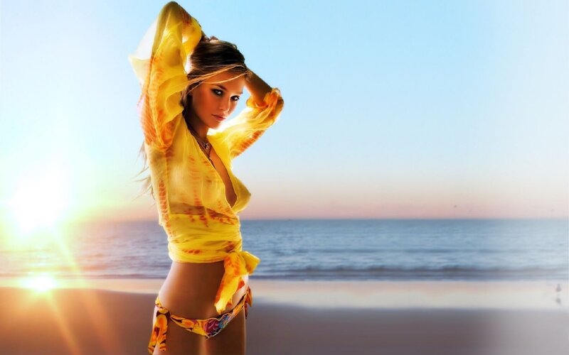 Woman on Beach at Sunset — Yellow, Serene