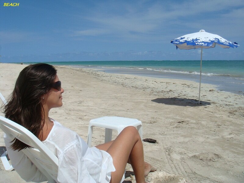 Woman on Beach Chair — Blue, Relaxed