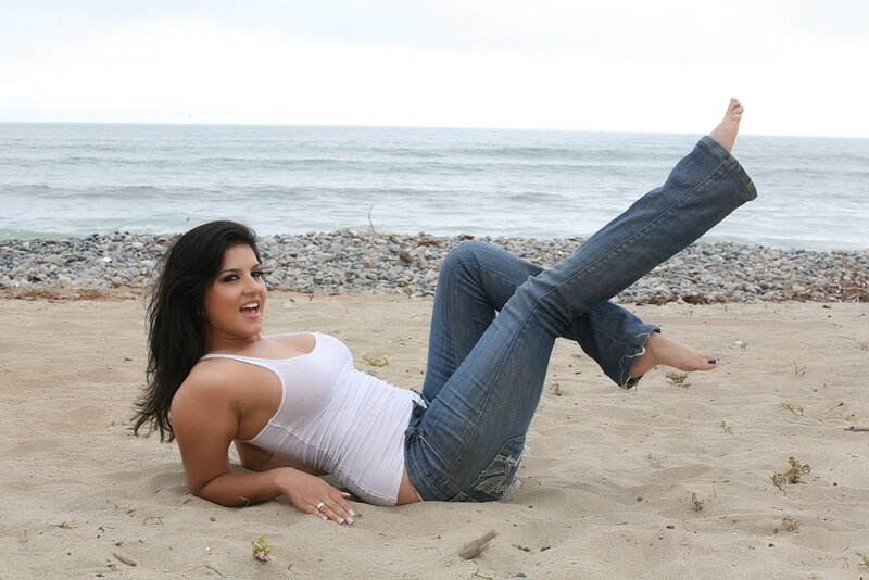 Woman on beach in jeans