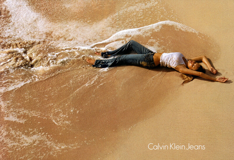 woman on beach in jeans