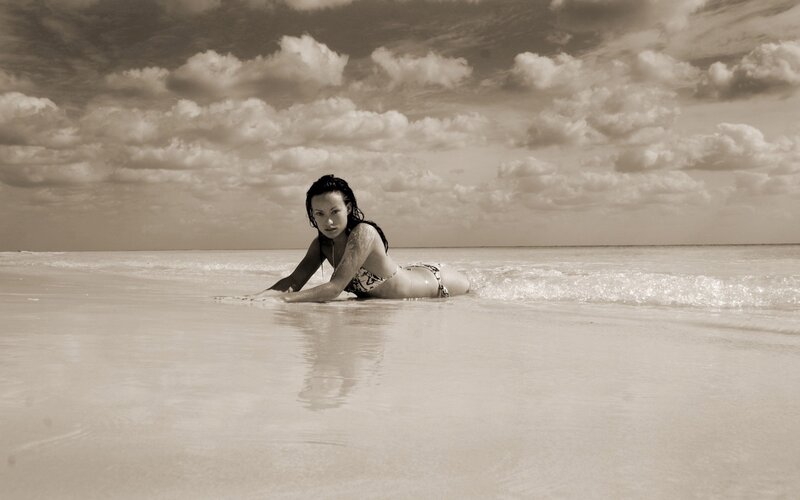 woman on beach in sepia