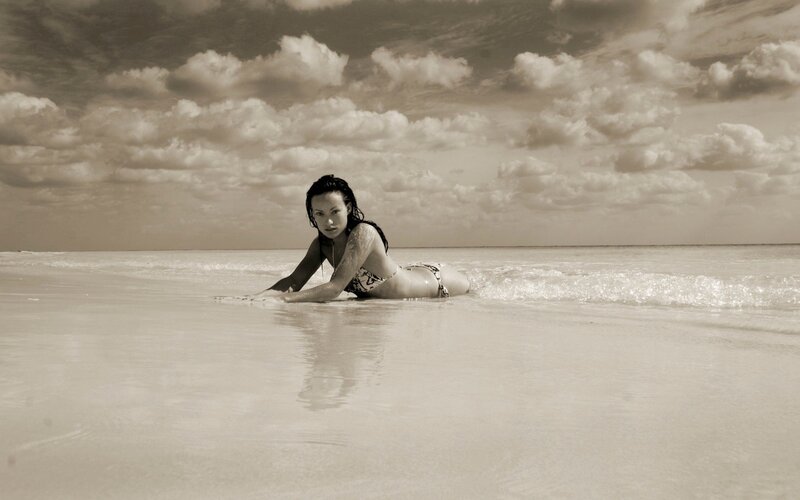 woman on beach in sepia