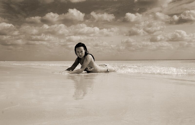 woman on beach in sepia