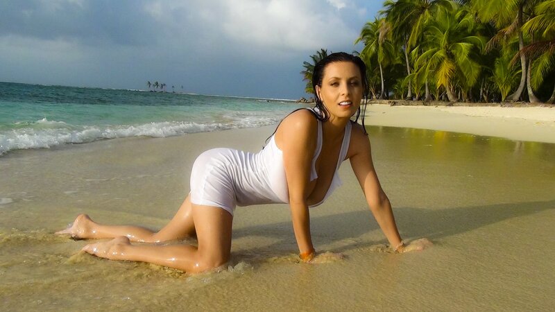 woman on beach in white dress