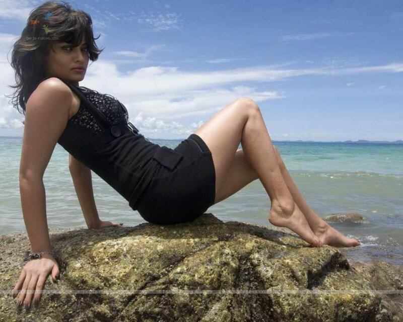 woman on beach rock