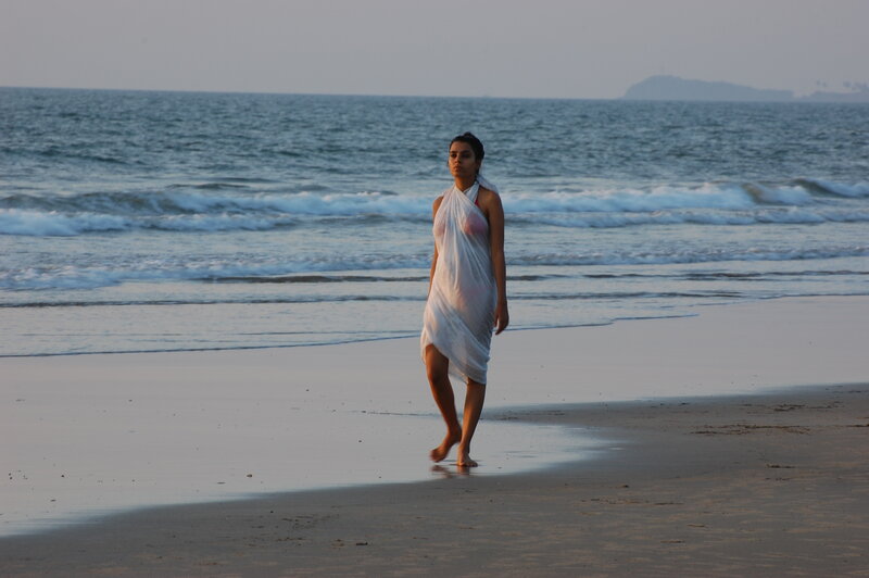 Woman on Beach — White, Serene, Sunset