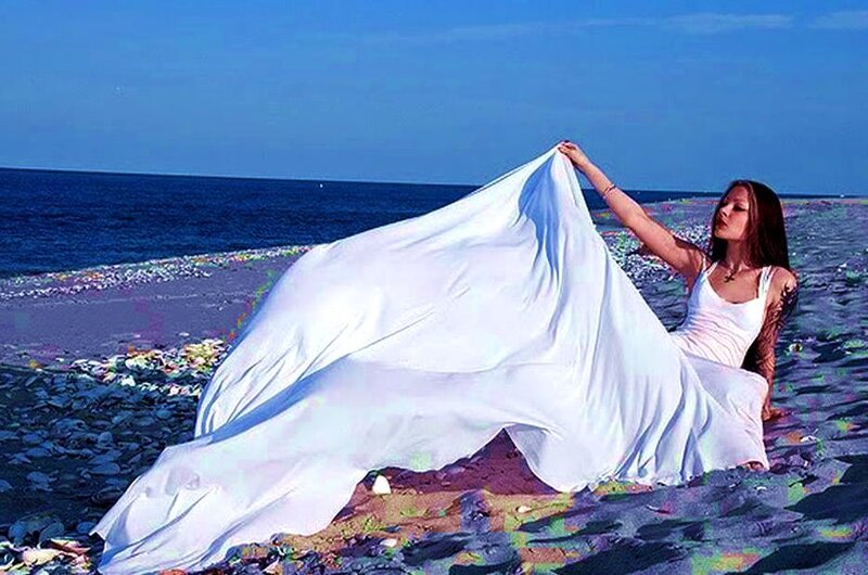 Woman on Beach with Cloth
