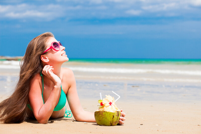Woman on Beach with Coconut — Blue