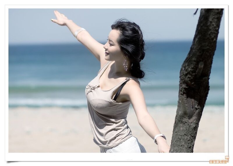 Woman on beach with ocean view