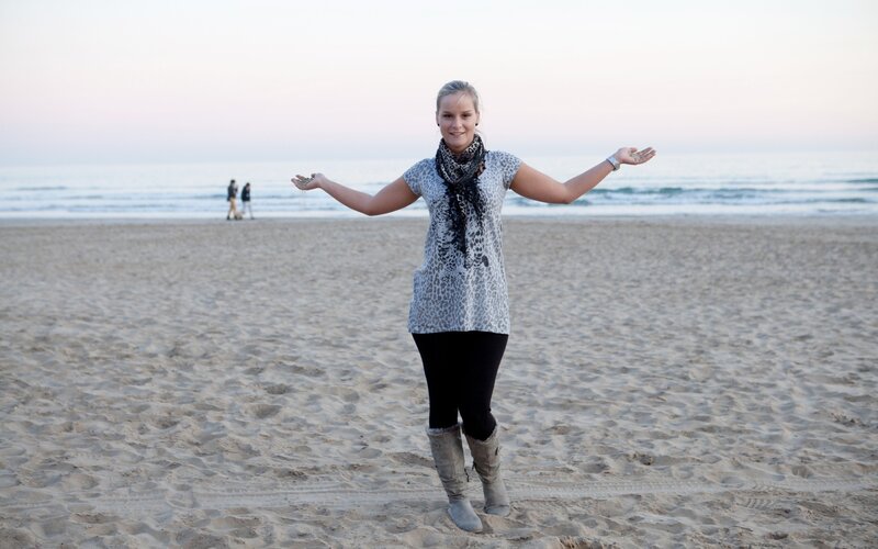 Woman on beach with sand