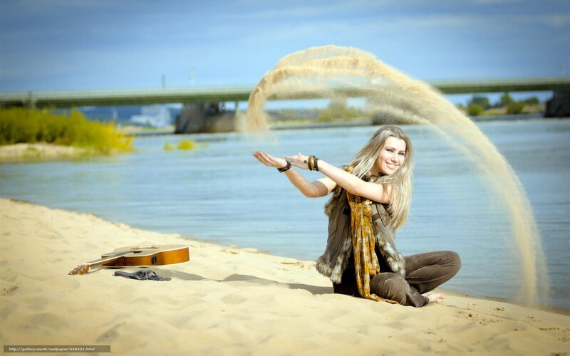 Woman on beach with sand