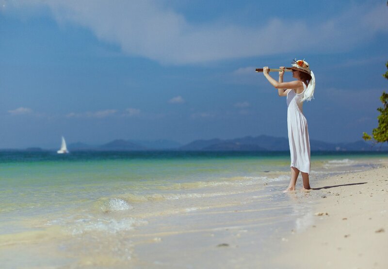 Woman on Beach with Telescope