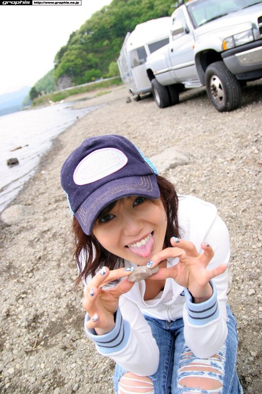 woman on beach with truck
