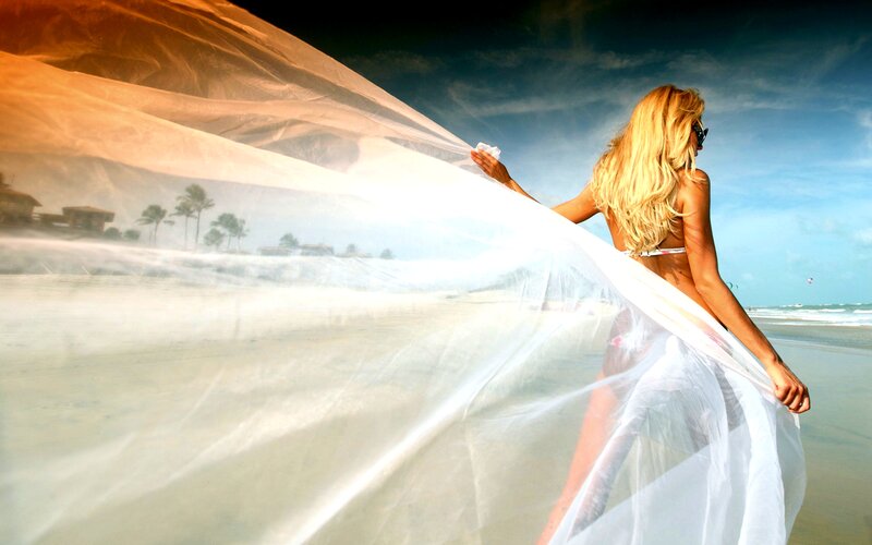 Woman on Beach with Veil
