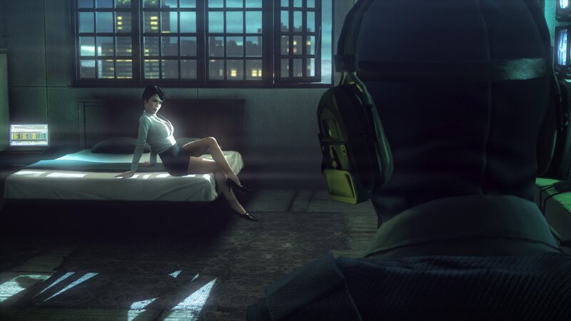 Woman on bed in dark room