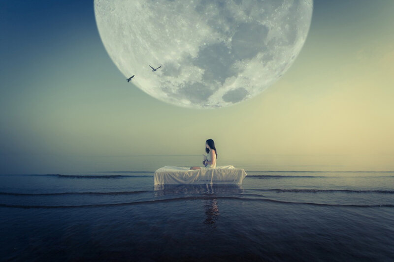 Woman on Bed in Water