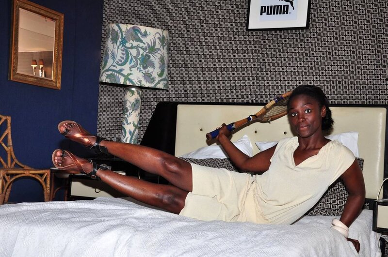 Woman on Bed with Racket — Blue