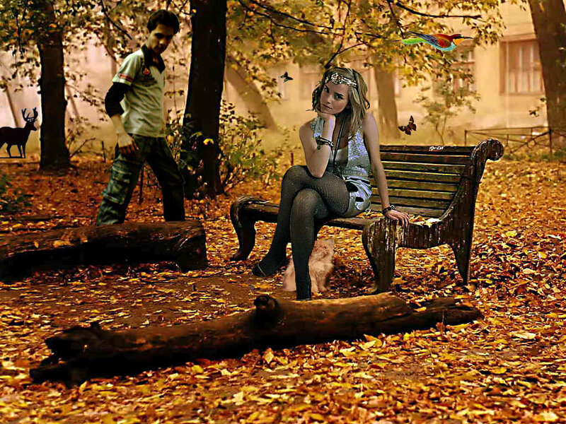 Woman on bench in autumn park