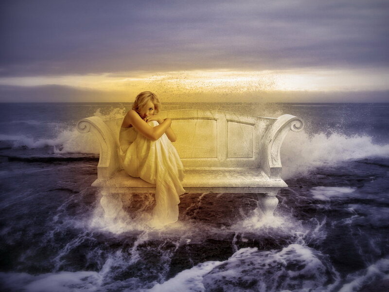 Woman on Bench in Ocean