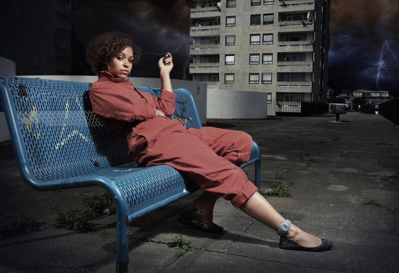 Woman on bench in storm