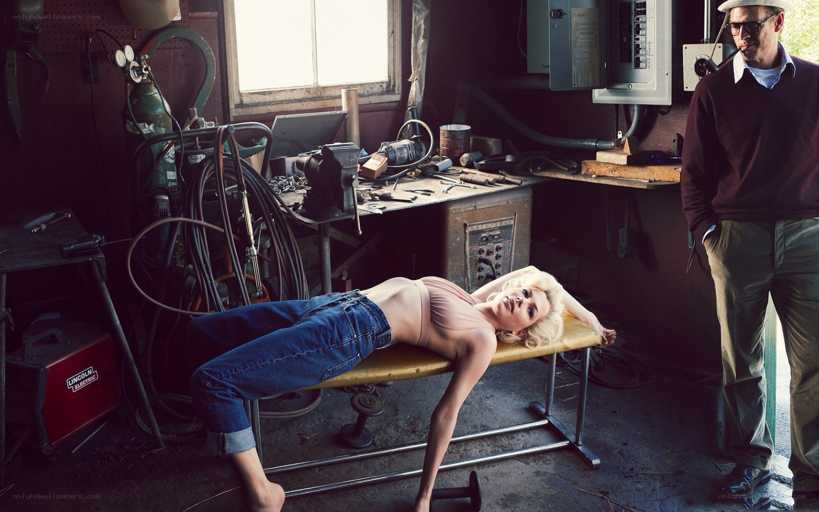 Woman on bench in workshop