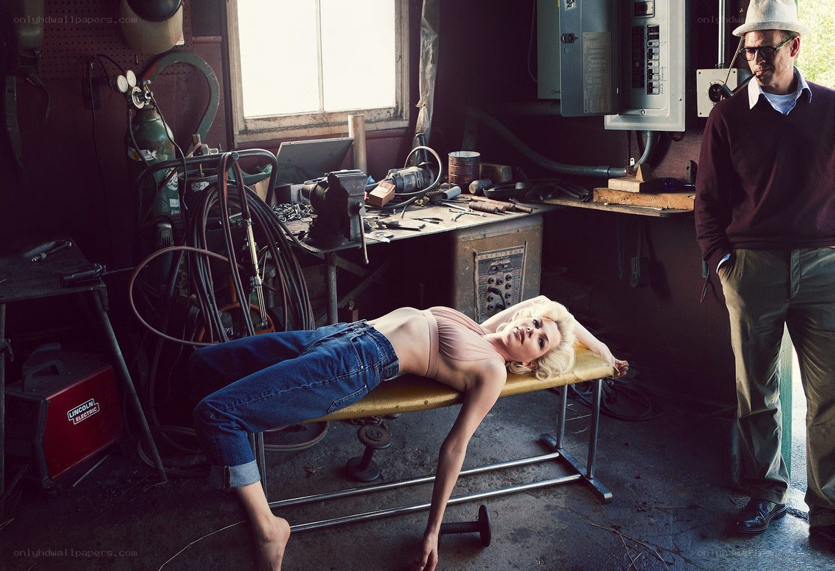 Woman on bench in workshop