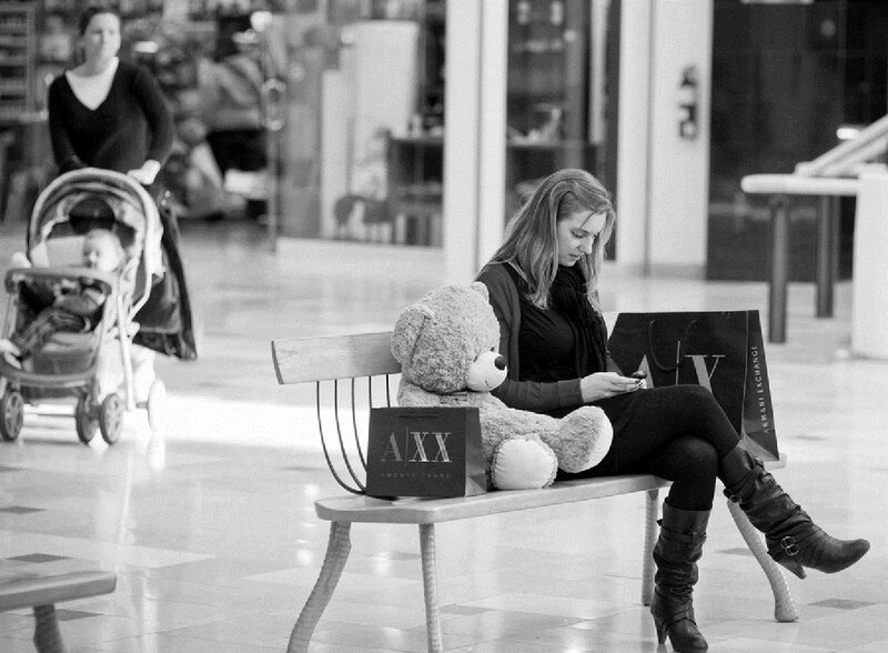 Woman on Bench with Teddy Bear