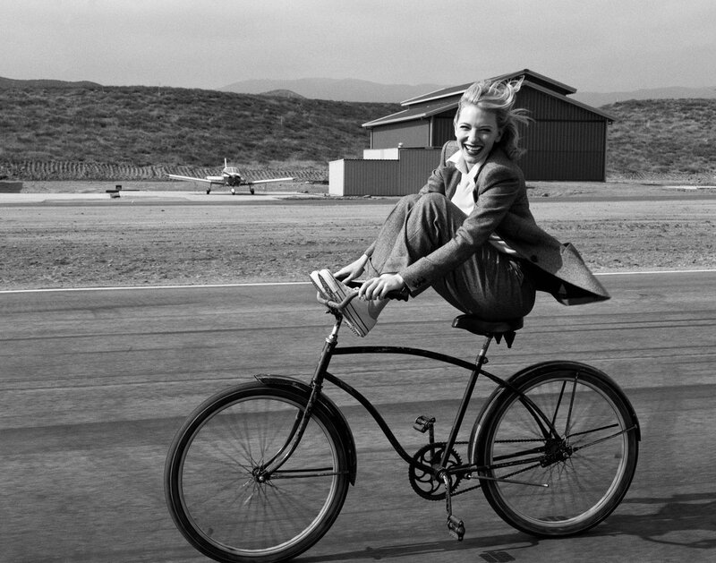 Woman on Bicycle — Black