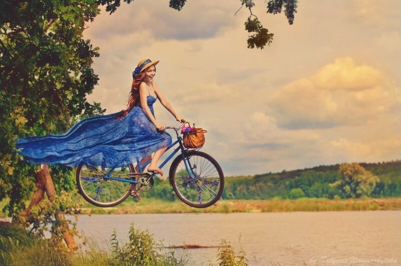 Woman on Bicycle — Blue, Serene