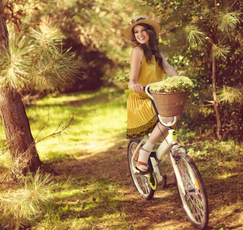 Woman on Bicycle — Yellow, Serene