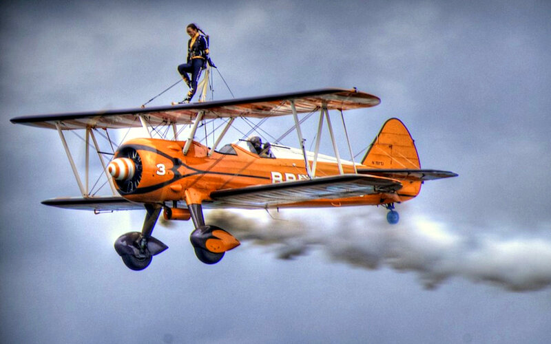 Woman on Biplane