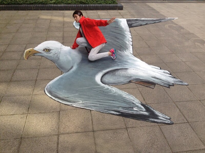Woman on Bird Mural