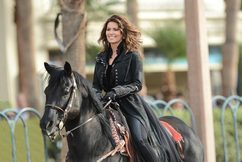 Woman on Black Horse — Confident