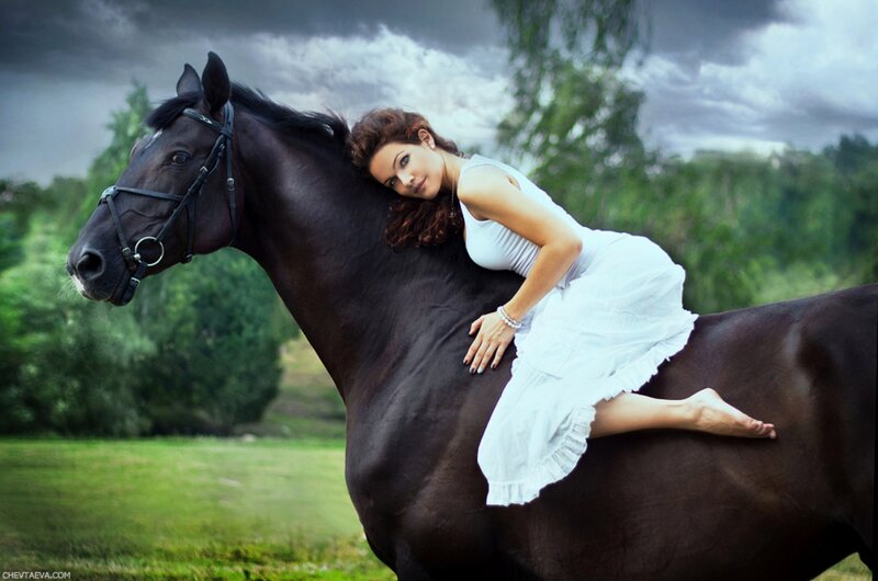 Woman on Black Horse — Dramatic, Photograph, Dress