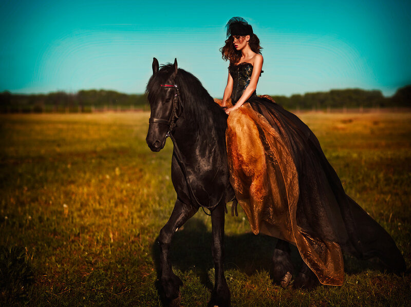 Woman on Black Horse — Dramatic, Sunset, Photograph