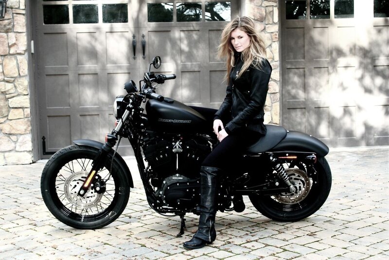 woman on black motorcycle