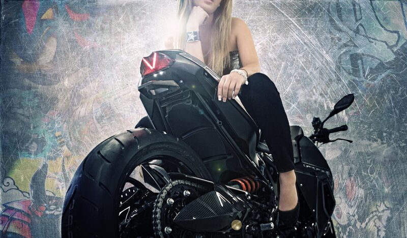 woman on black motorcycle