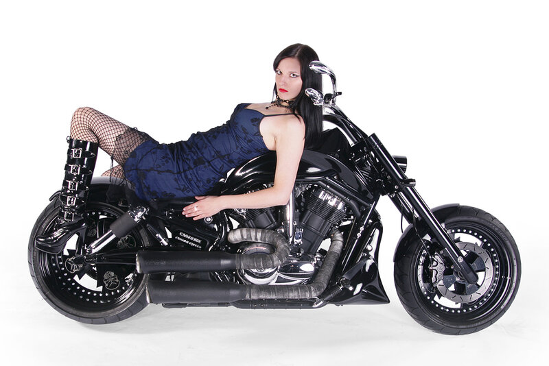 Woman on black motorcycle