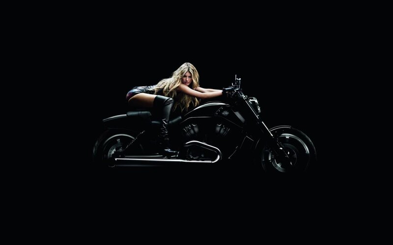 woman on black motorcycle