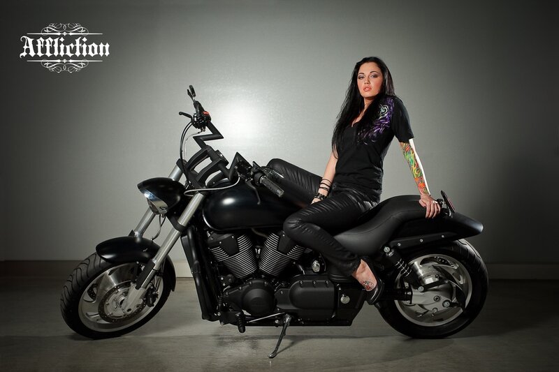 woman on black motorcycle