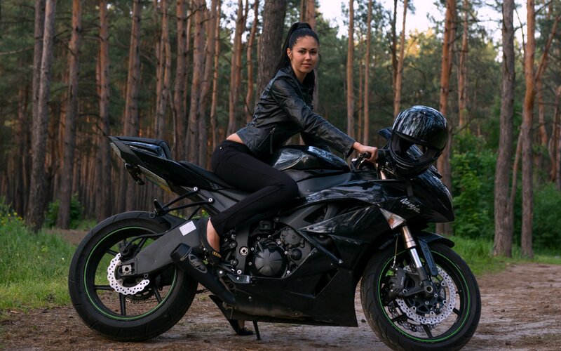 Woman on Black Motorcycle — Calm